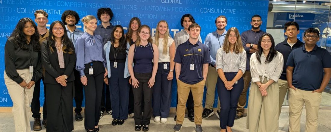 Group of interns in front of Donaldson headquarters. 