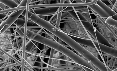 Figure 7: Clean air-oil separator media (left) versus contaminated media (right).